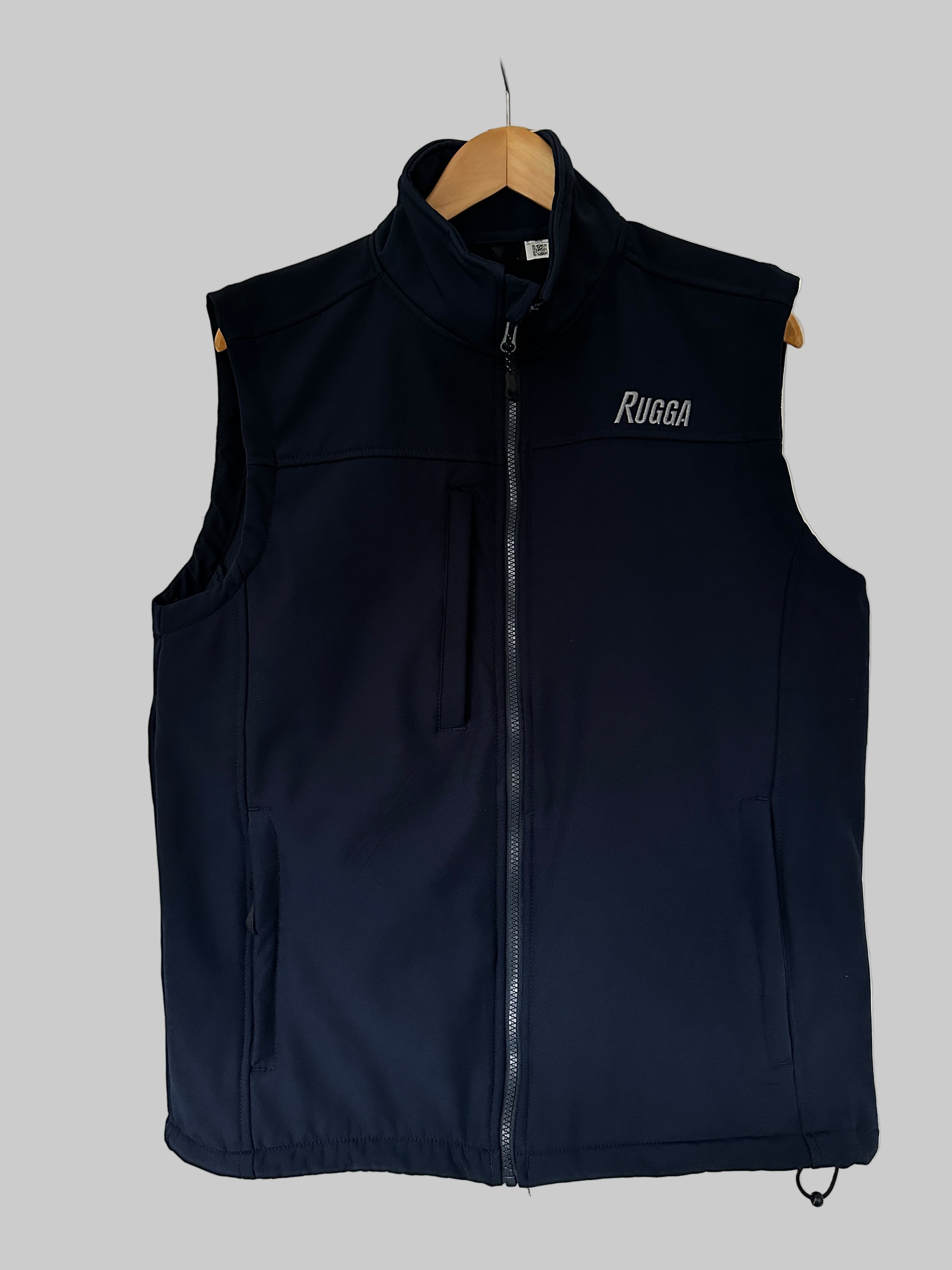 Navy blue vest with 'Rugga' branding on a gray background