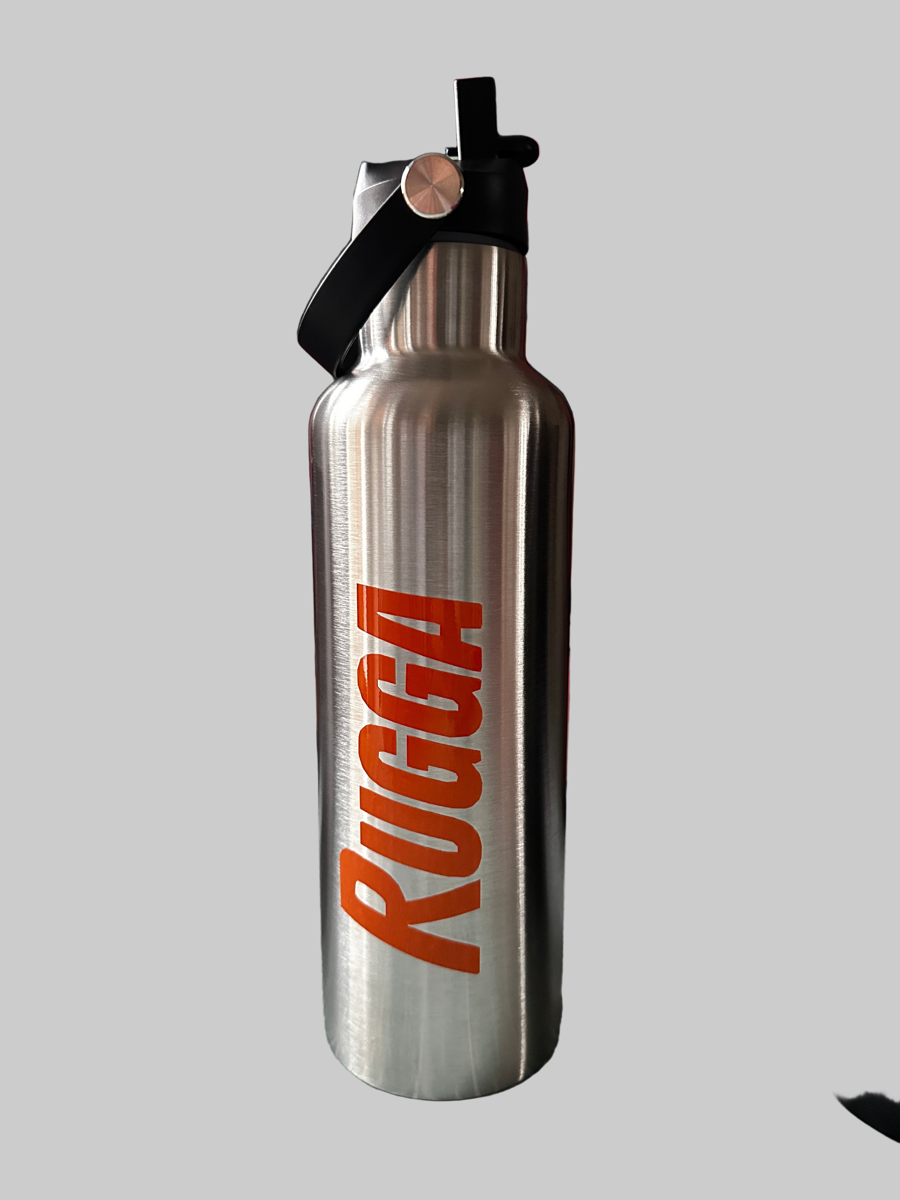Stainless steel water bottle with 'RUGGA' branding on a gray background