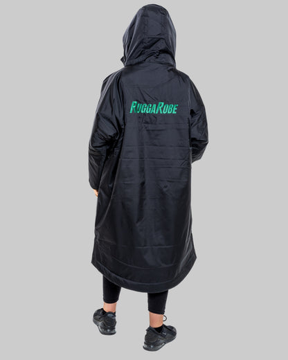 Model wearing a black and green RuggerRobe on a grey background