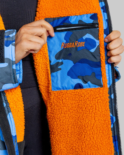 Orange fleece change robe with blue camouflage pattern and 'Rugga Robe' logo on a plain background