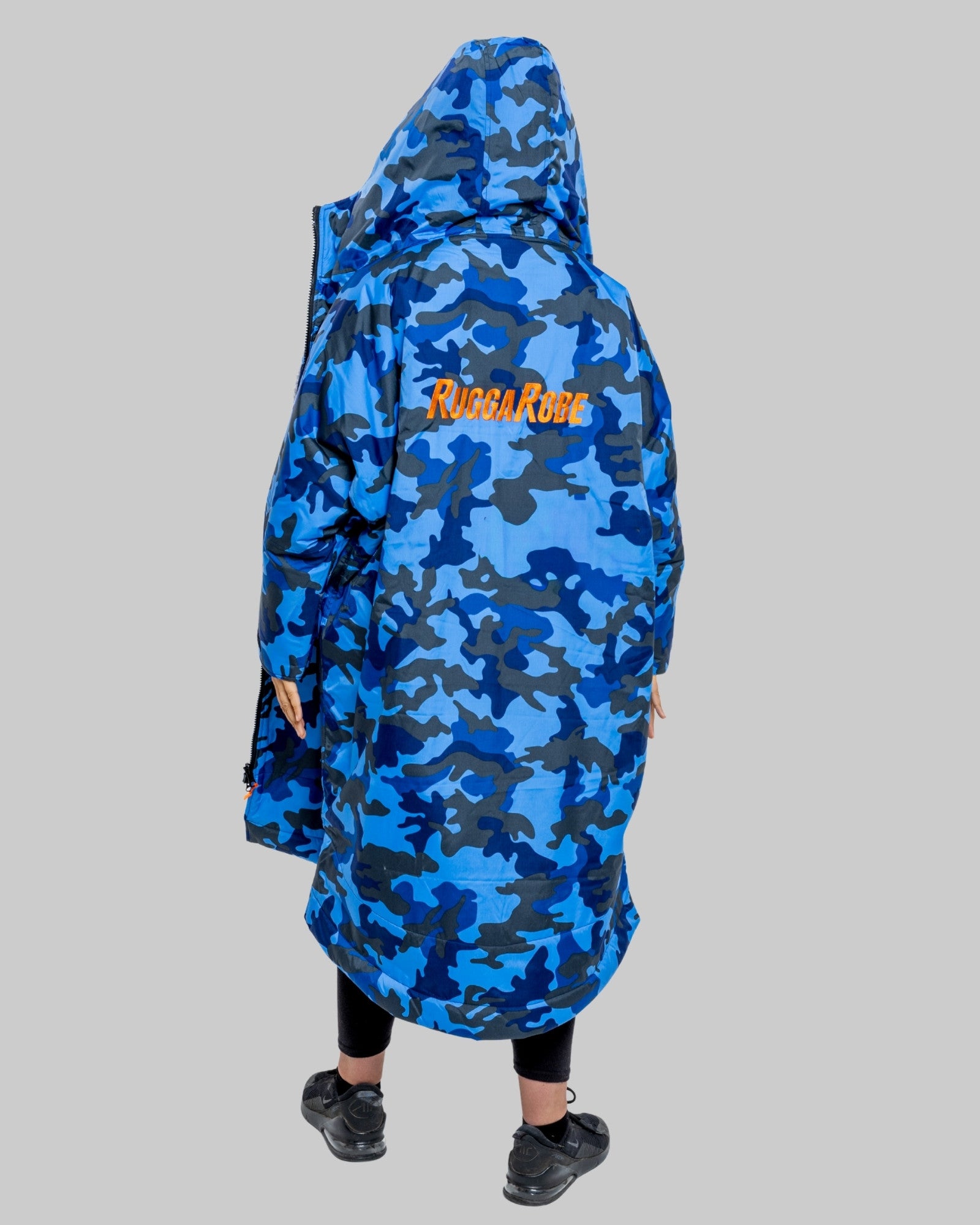 Blue camouflage changerobe with 'Ruggarobe' branding on a grey background