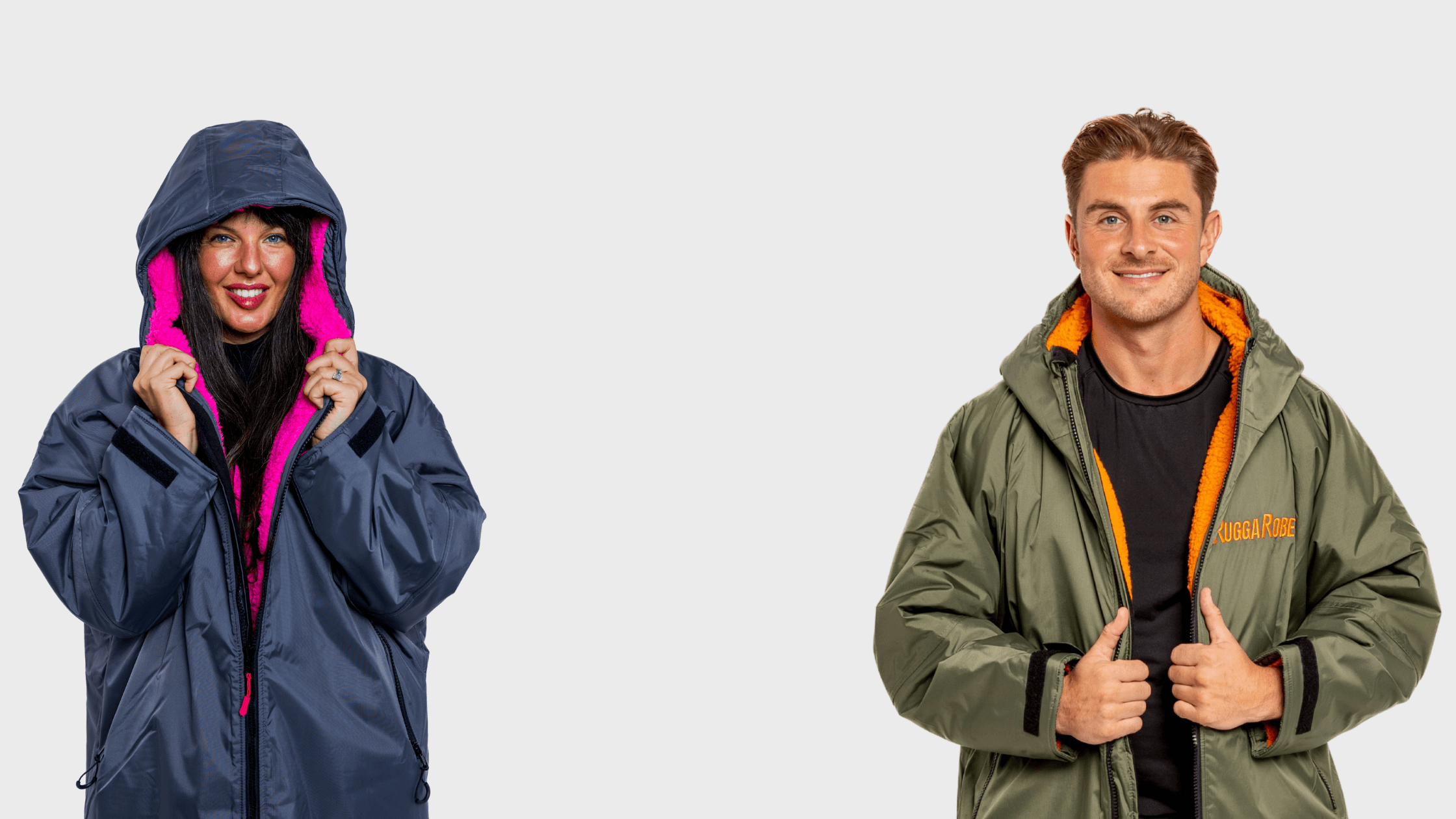 Two people wearing colourful RuggaRobes against a plain background