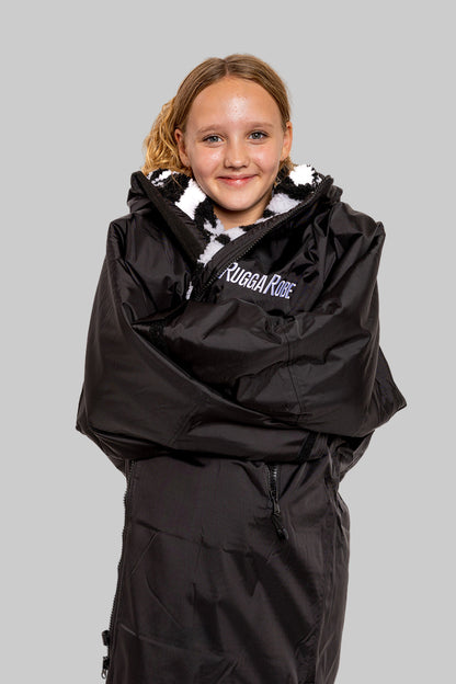 Model wearing RuggaRobe zebra  change robe on grey background